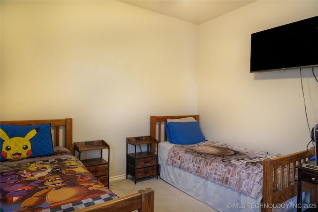 bedroom featuring light colored carpet