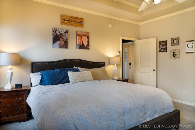 carpeted bedroom featuring ornamental molding and ceiling fan