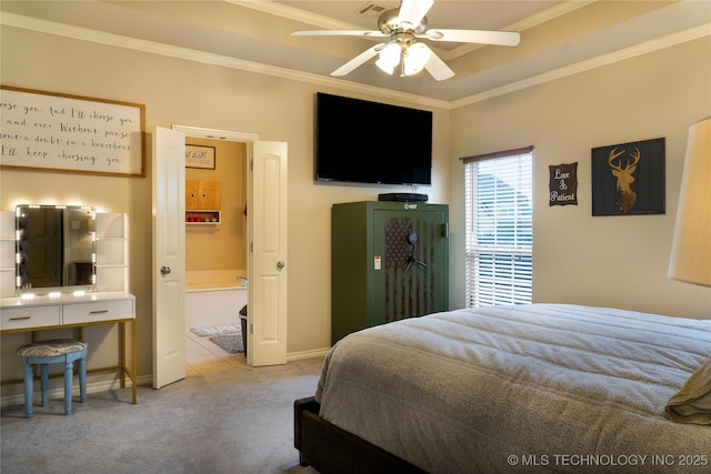 carpeted bedroom with fridge, ceiling fan, crown molding, and ensuite bath