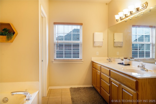 bathroom featuring vanity, tile patterned flooring, and a bathtub