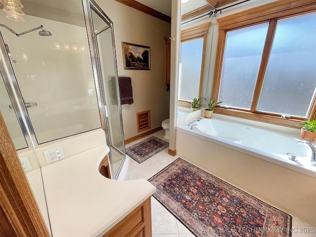 full bathroom with heating unit, vanity, separate shower and tub, toilet, and tile patterned floors