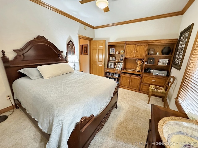 bedroom with ceiling fan, ornamental molding, and light colored carpet