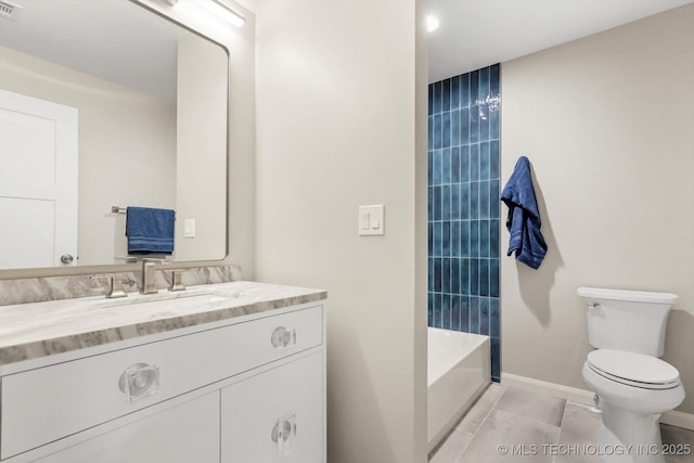 full bathroom featuring vanity, toilet, tiled shower / bath combo, and tile patterned flooring