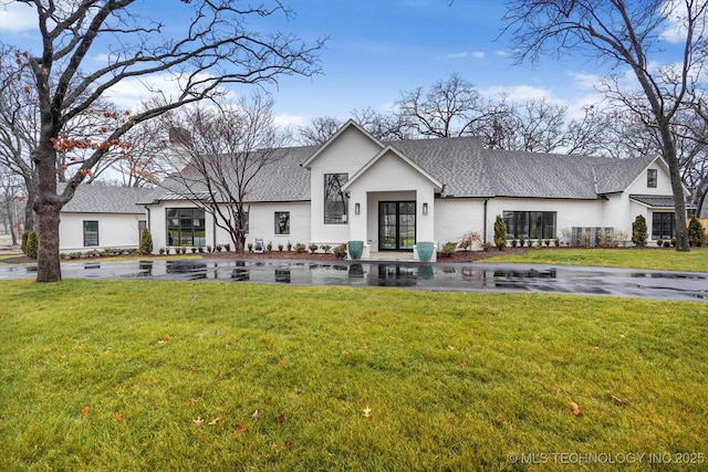 exterior space featuring a front lawn