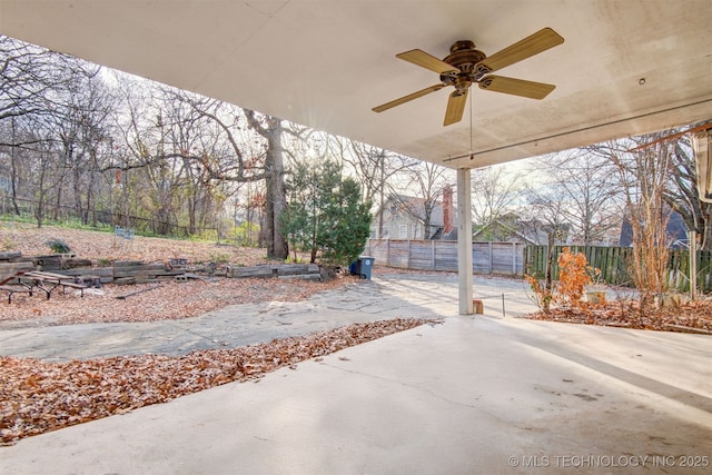 view of patio featuring ceiling fan