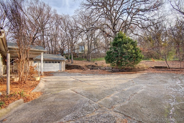 view of patio with a garage