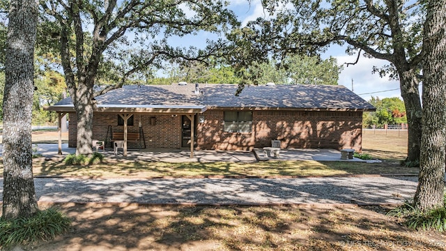 back of house featuring a patio area