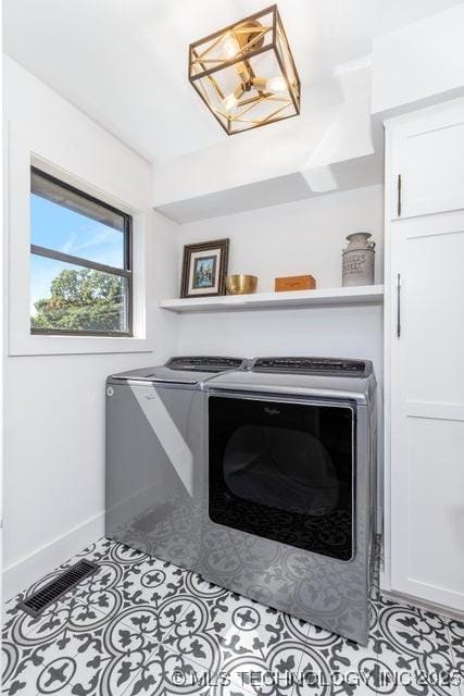 laundry room featuring independent washer and dryer