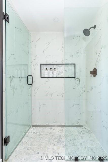 bathroom with an enclosed shower