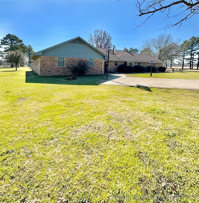 exterior space with a lawn