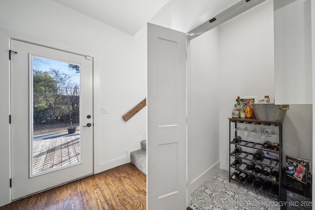 2508 E 16th St, Tulsa, OK 74104 - entrance foyer featuring wood finished floors, stairs, and baseboards