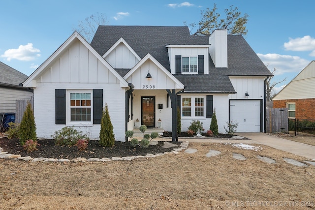 modern farmhouse style home featuring a garage