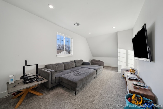 living room with lofted ceiling and carpet flooring