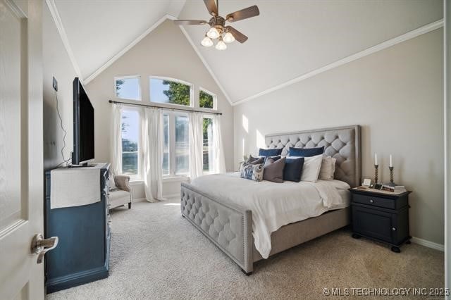 bedroom featuring crown molding, lofted ceiling, light carpet, and ceiling fan