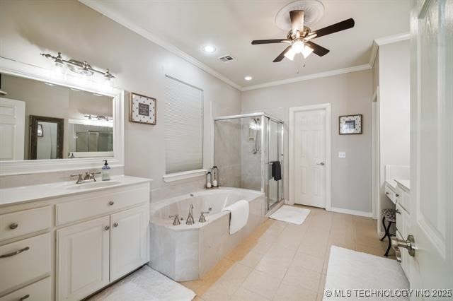 bathroom featuring crown molding, ceiling fan, vanity, tile patterned floors, and separate shower and tub