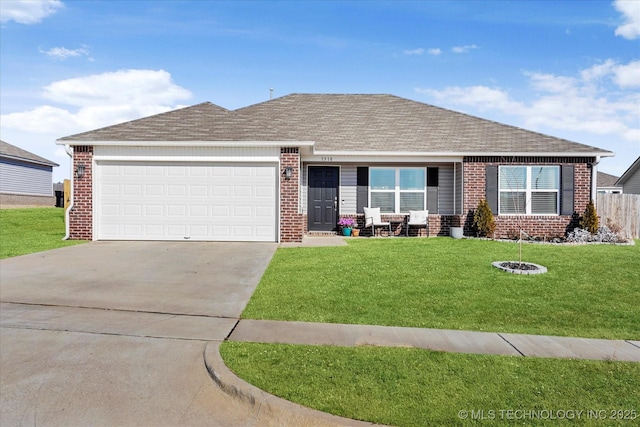 ranch-style house with a garage and a front yard