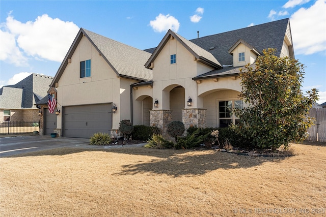 view of front of property featuring a garage