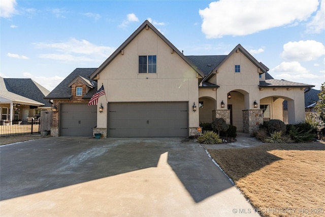 view of front of property with a garage