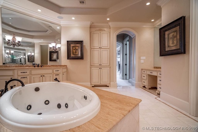 bathroom with ornamental molding, a raised ceiling, tile patterned flooring, and vanity