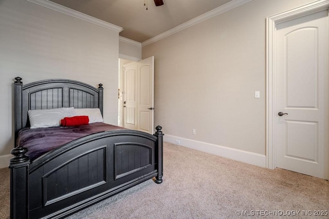 carpeted bedroom featuring crown molding and ceiling fan