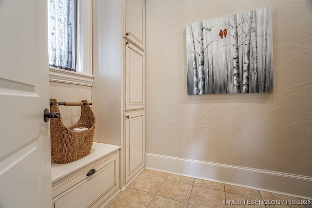 mudroom featuring light tile patterned floors