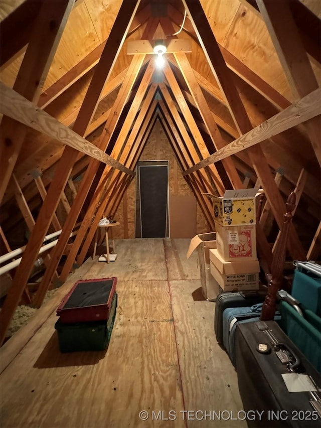 view of unfinished attic