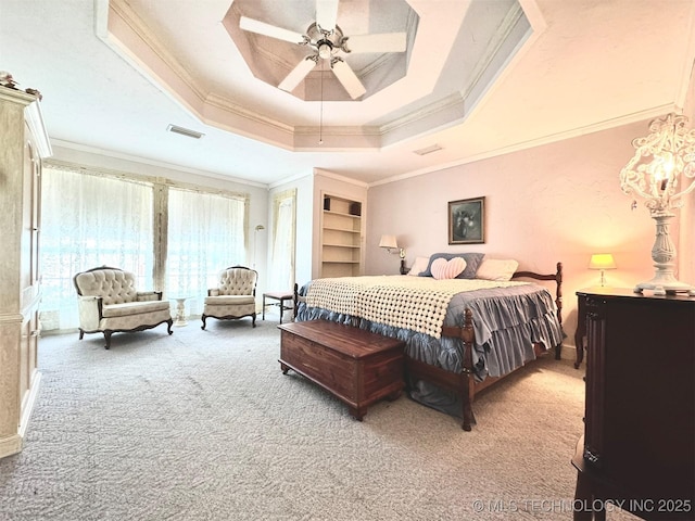 carpeted bedroom featuring ornamental molding, a raised ceiling, and ceiling fan