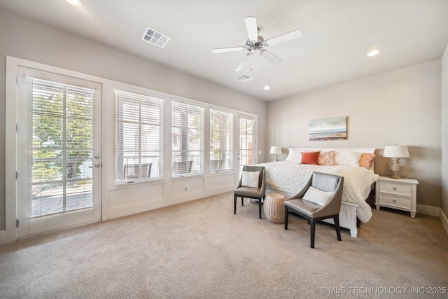 bedroom with light carpet, multiple windows, access to outside, and ceiling fan