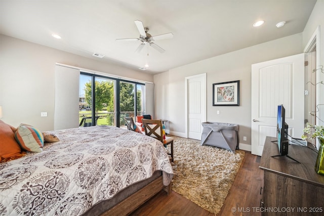 bedroom with dark wood-type flooring, ceiling fan, and access to outside