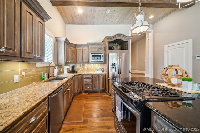 kitchen with tasteful backsplash, sink, wood ceiling, and stainless steel appliances