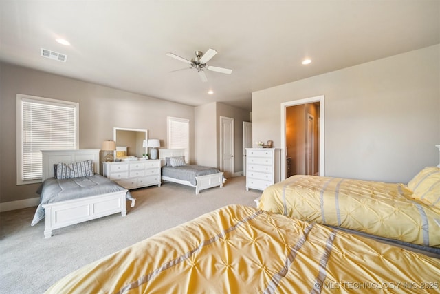 carpeted bedroom with ceiling fan