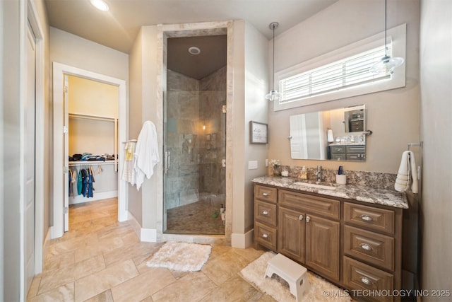 bathroom featuring vanity and walk in shower