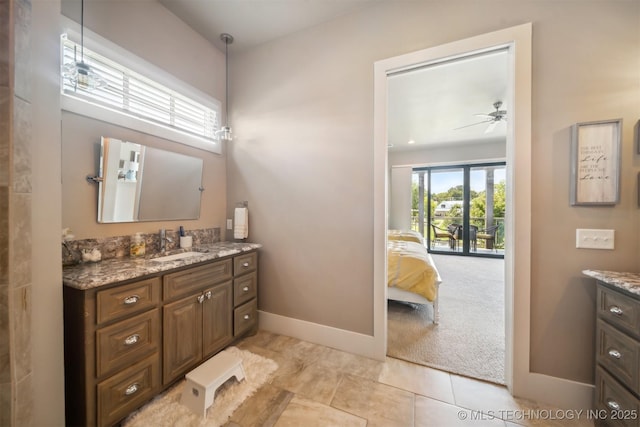 bathroom featuring vanity, tile patterned floors, and ceiling fan