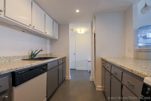 kitchen featuring white cabinetry, dishwasher, sink, and hanging light fixtures