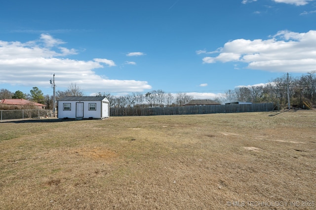 view of yard with a storage shed