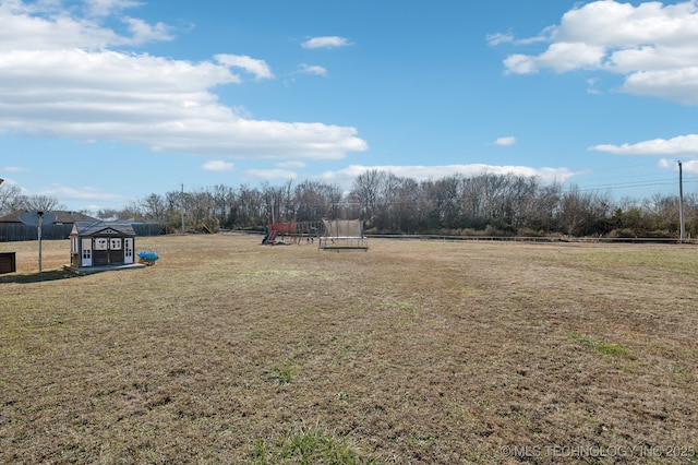 view of yard featuring a trampoline