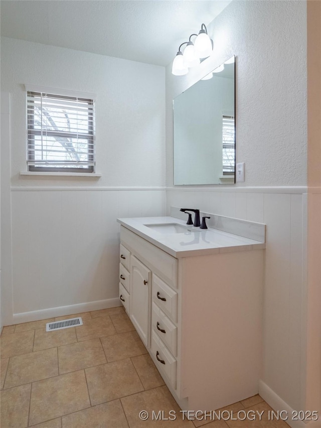 bathroom featuring vanity and tile patterned floors