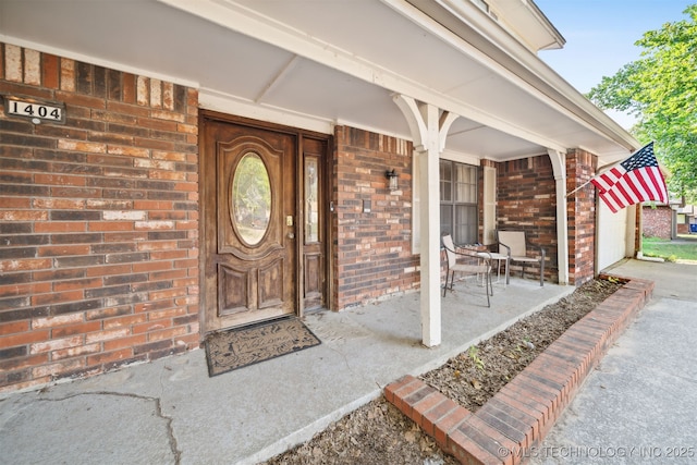 entrance to property with a porch