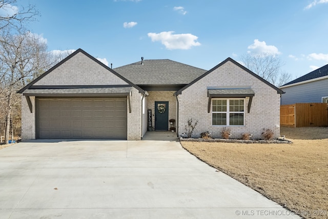 ranch-style home with a garage