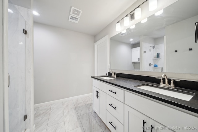 bathroom featuring vanity and walk in shower