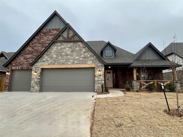 craftsman house with a garage