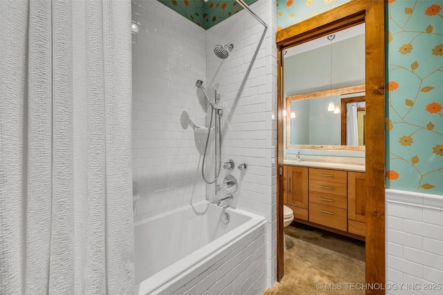 full bathroom with vanity, shower / bath combination with curtain, and toilet