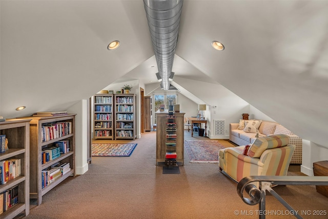 interior space with lofted ceiling and carpet