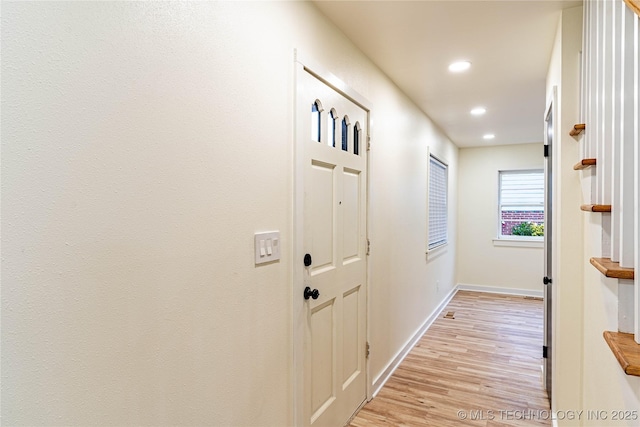 hallway featuring light hardwood / wood-style flooring