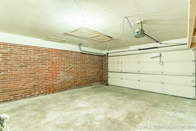 garage featuring a garage door opener