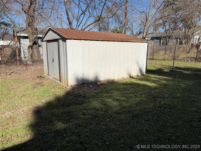 view of outbuilding featuring a yard