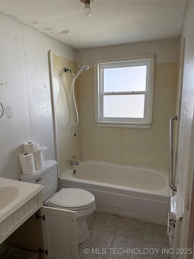 bathroom with tile patterned flooring, shower / washtub combination, and toilet