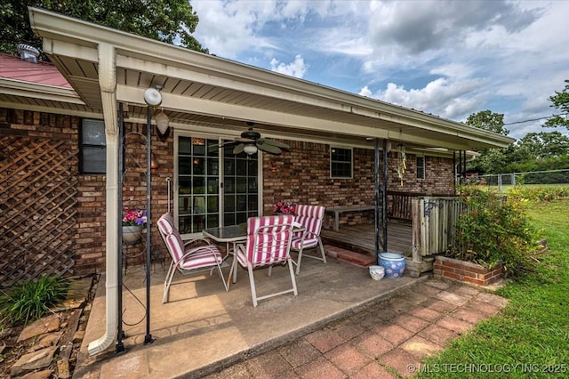 view of patio featuring ceiling fan