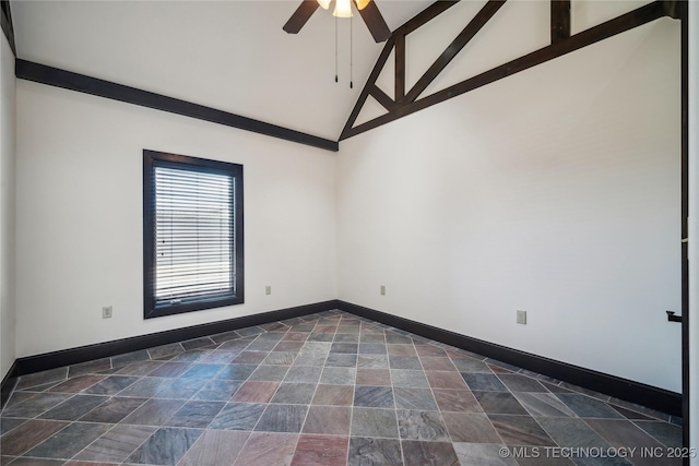 spare room featuring high vaulted ceiling and ceiling fan