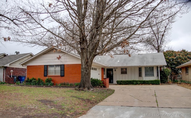 single story home featuring a garage and a front yard